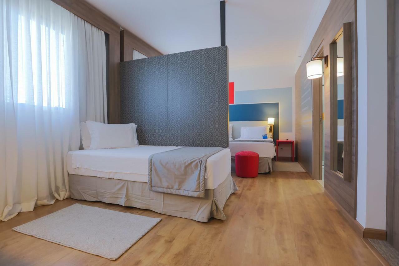 Hotel Tryp By Wyndham Ribeirão Preto Exterior foto A room at the hotel