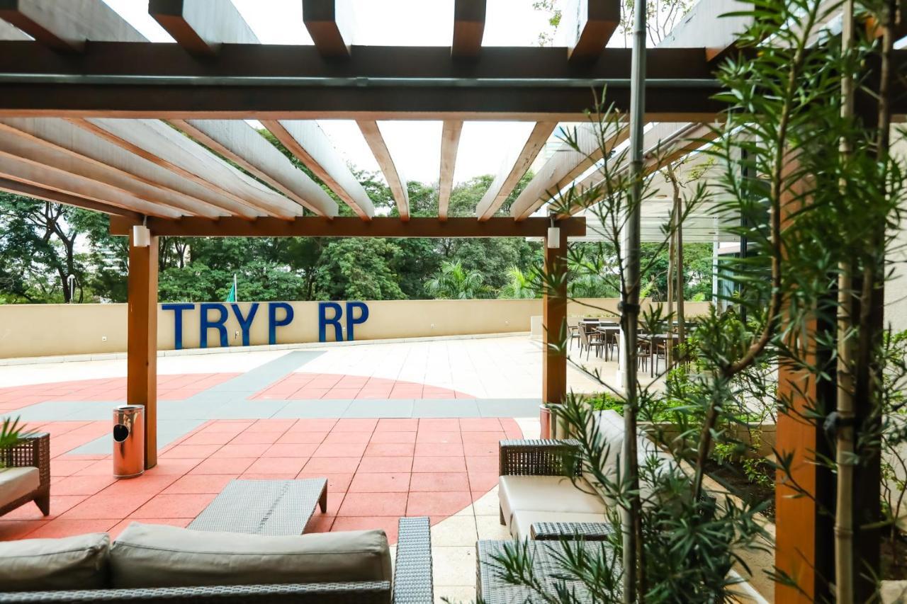 Hotel Tryp By Wyndham Ribeirão Preto Exterior foto The rooftop of the RP Library